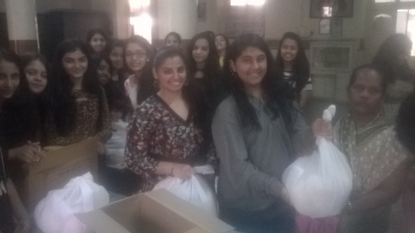 Crib competition & Distribution of Christmas hampers